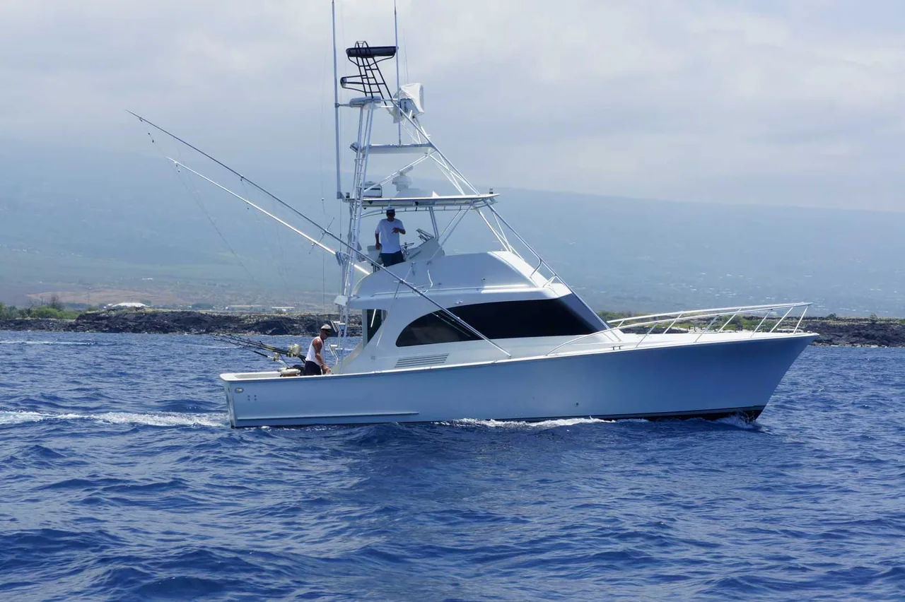 Miss Mojo 41’ G&S charter boat cruising off the Kona coast